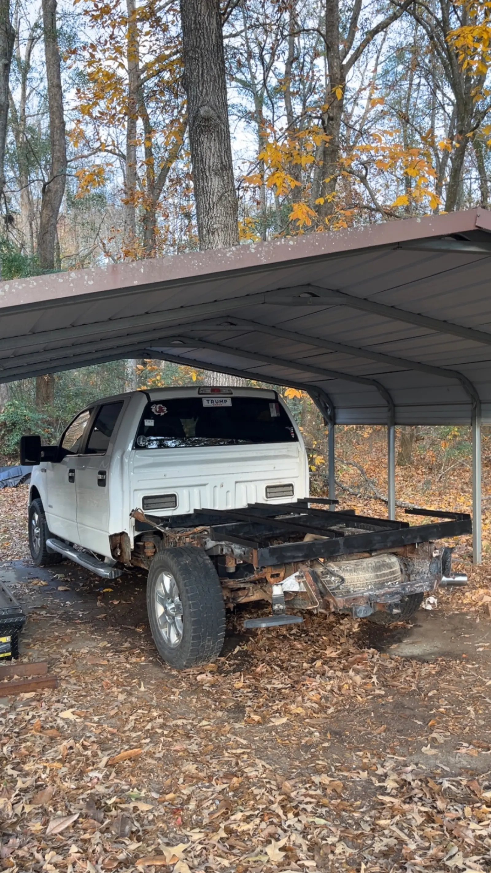 Custom flatbed frame fabrication on a Ford F-150 pickup