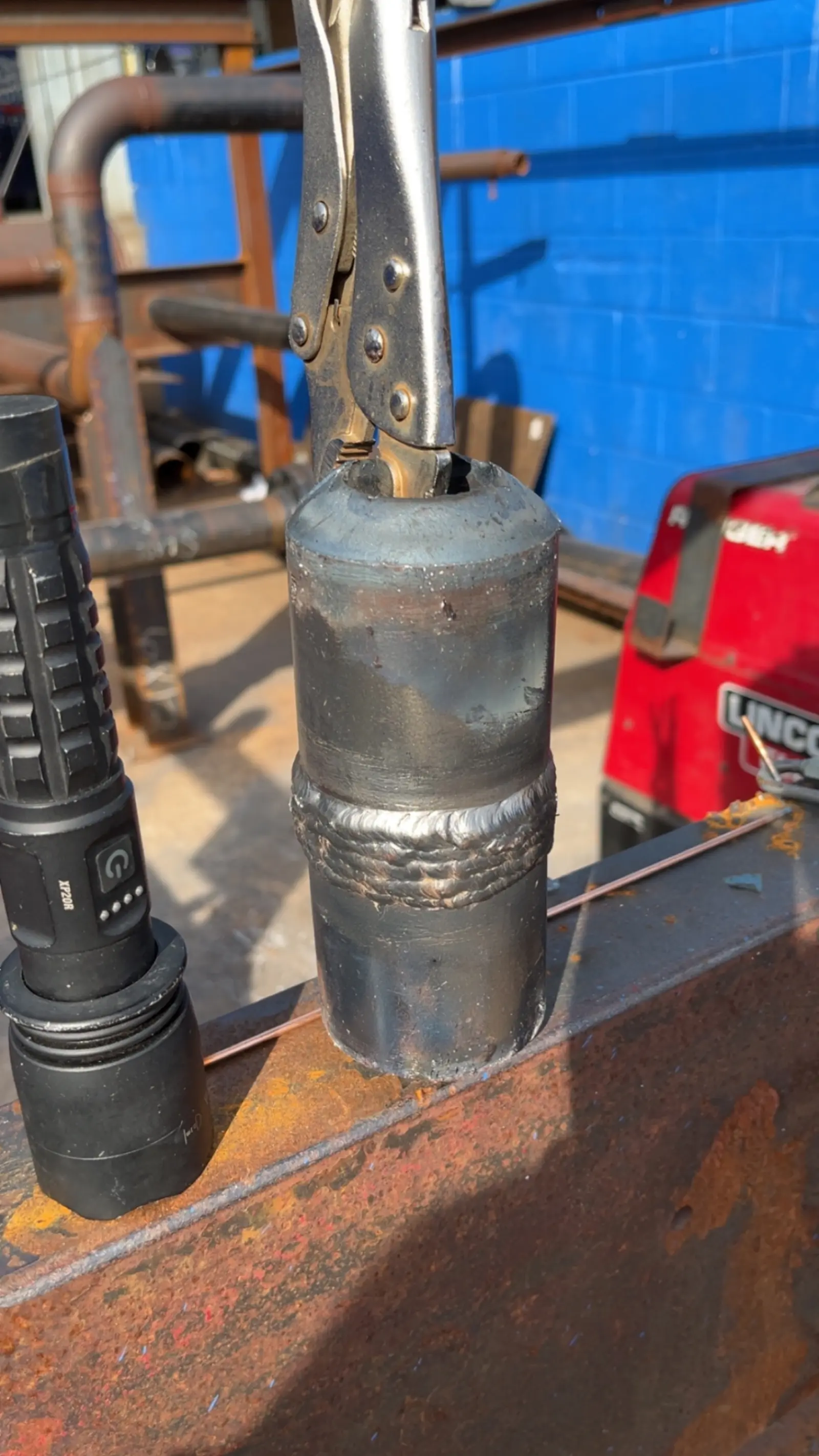 Stick weld on a vertical pipe joint