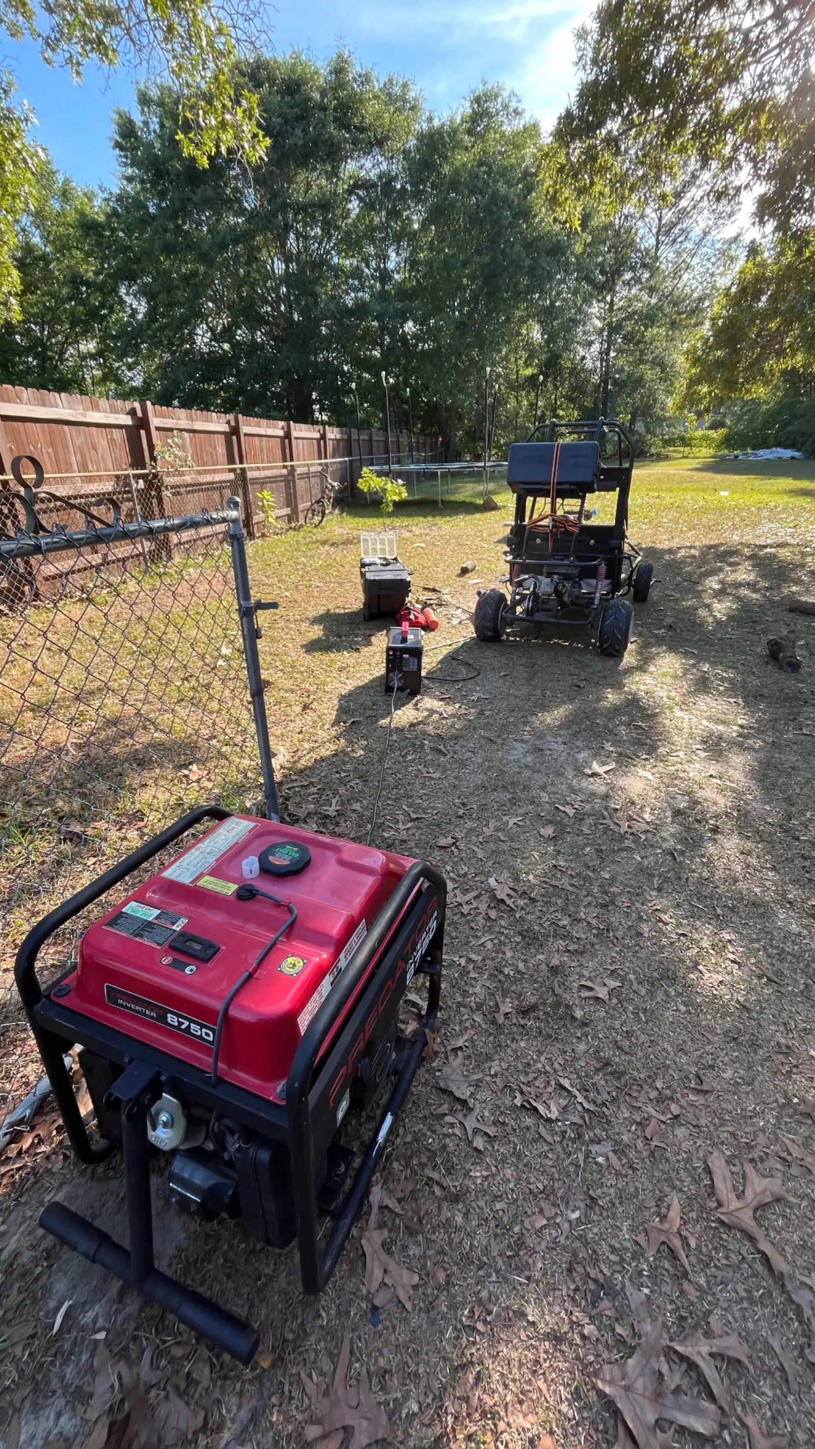 Mobile welding setup on the jobsite with generator, welder, and go-kart frame